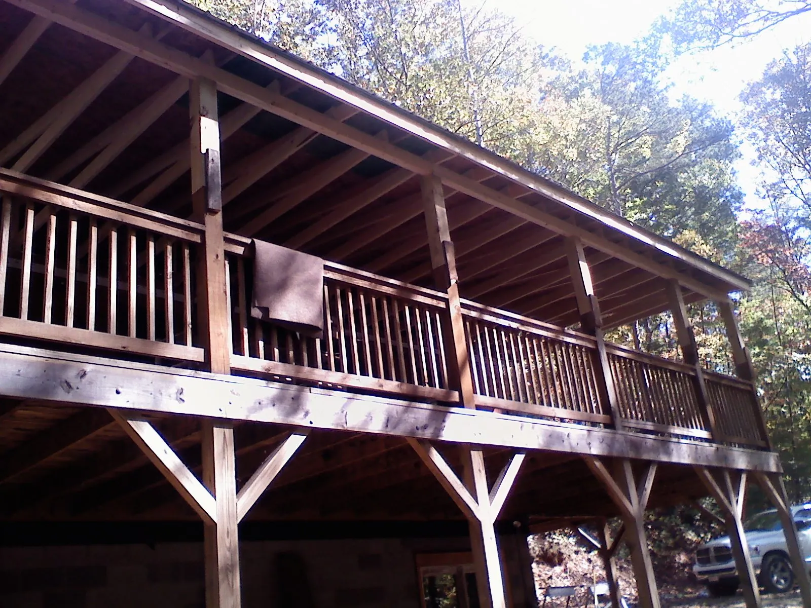 Timber framing under a new elevated porch and deck — Roof Leak Repair in Quilcene by Roofing Brothers